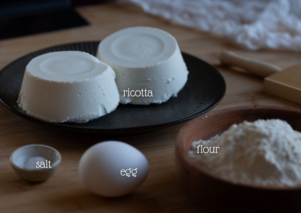 The ingredients needed to make ricotta gnocchi.