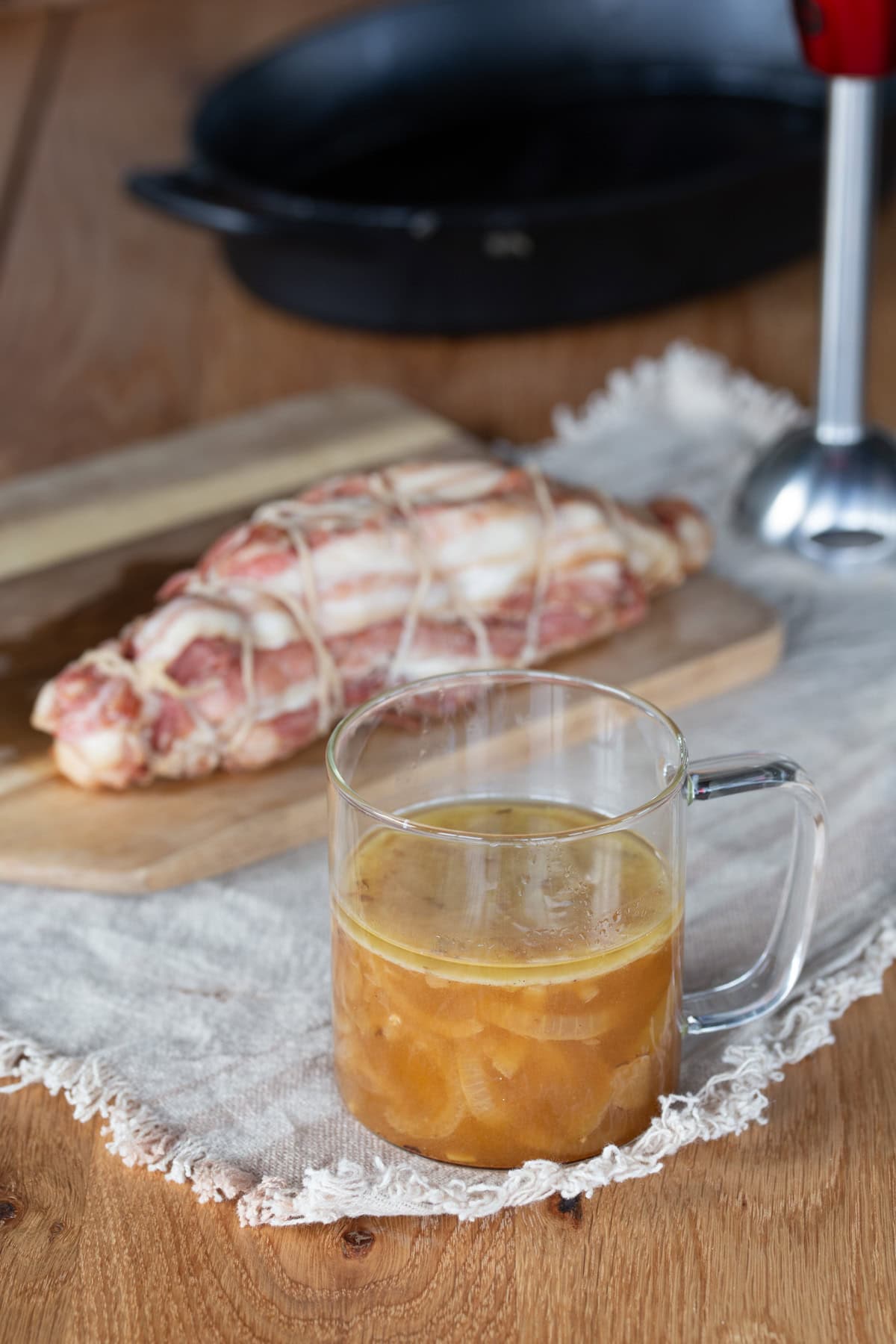 Turkey roast juices in see-through container.