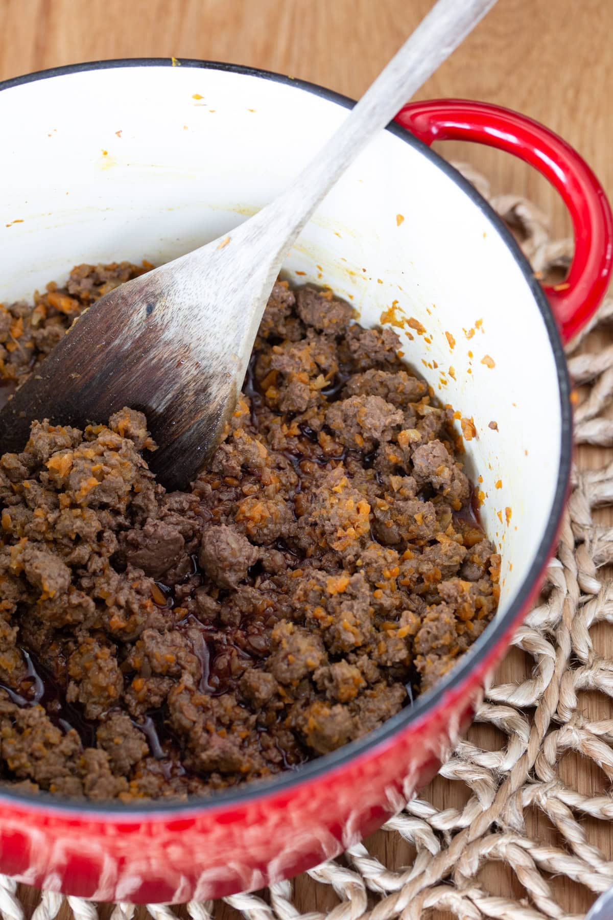 Minced meat sauteed with vegetable soffritto in a Dutch oven.