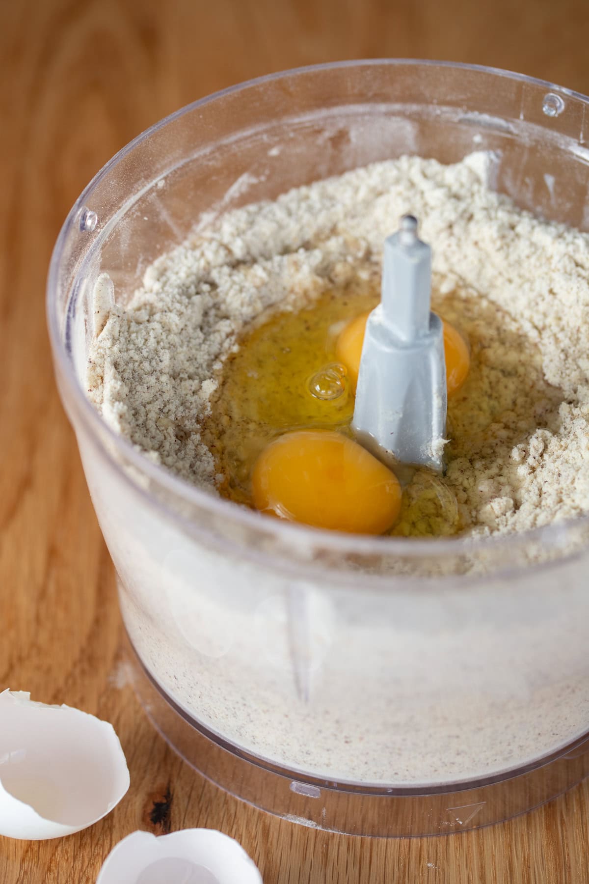 Adding eggs to rest of ingredients.