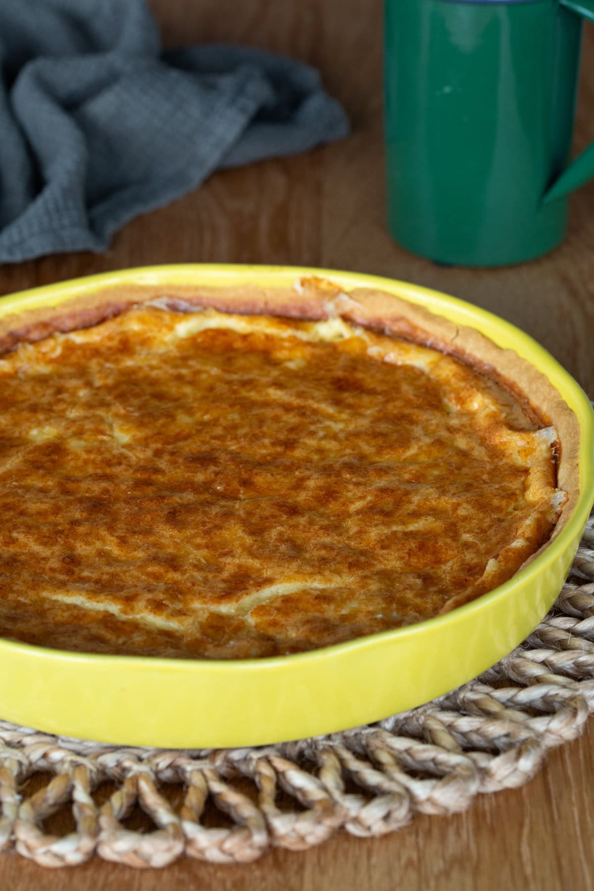 Västerbottenpaj Swedish cheese pie in a yellow dish.