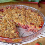 Strawberry rhubarb crisp, one slice missing.