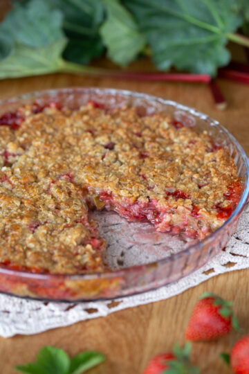 Strawberry rhubarb crisp, one slice missing.
