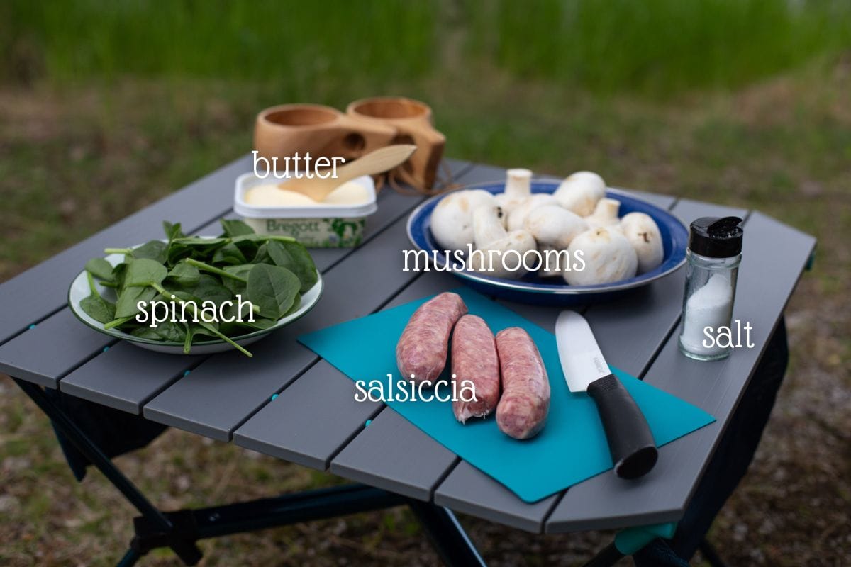 The ingredients needed for this recipe, shown on a camping table.