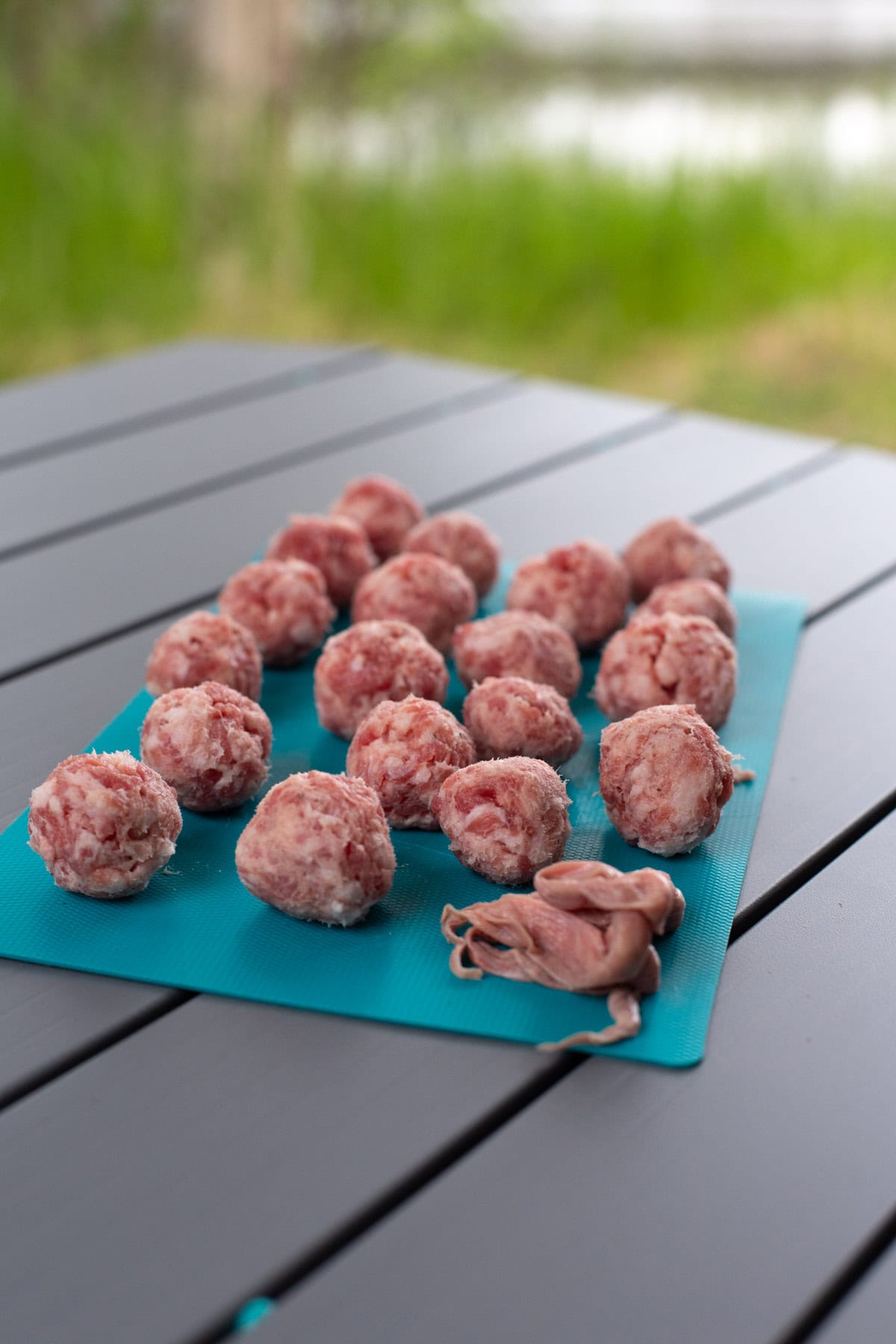 Making salsiccia meatballs.