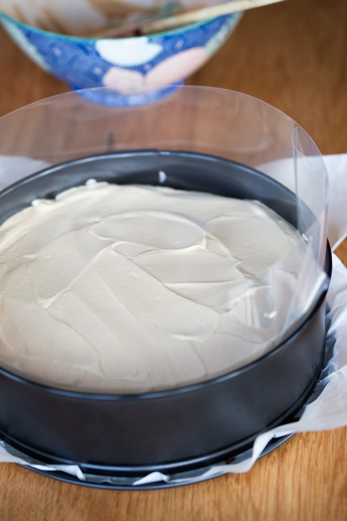 Cake filled, cake collar onto sides.