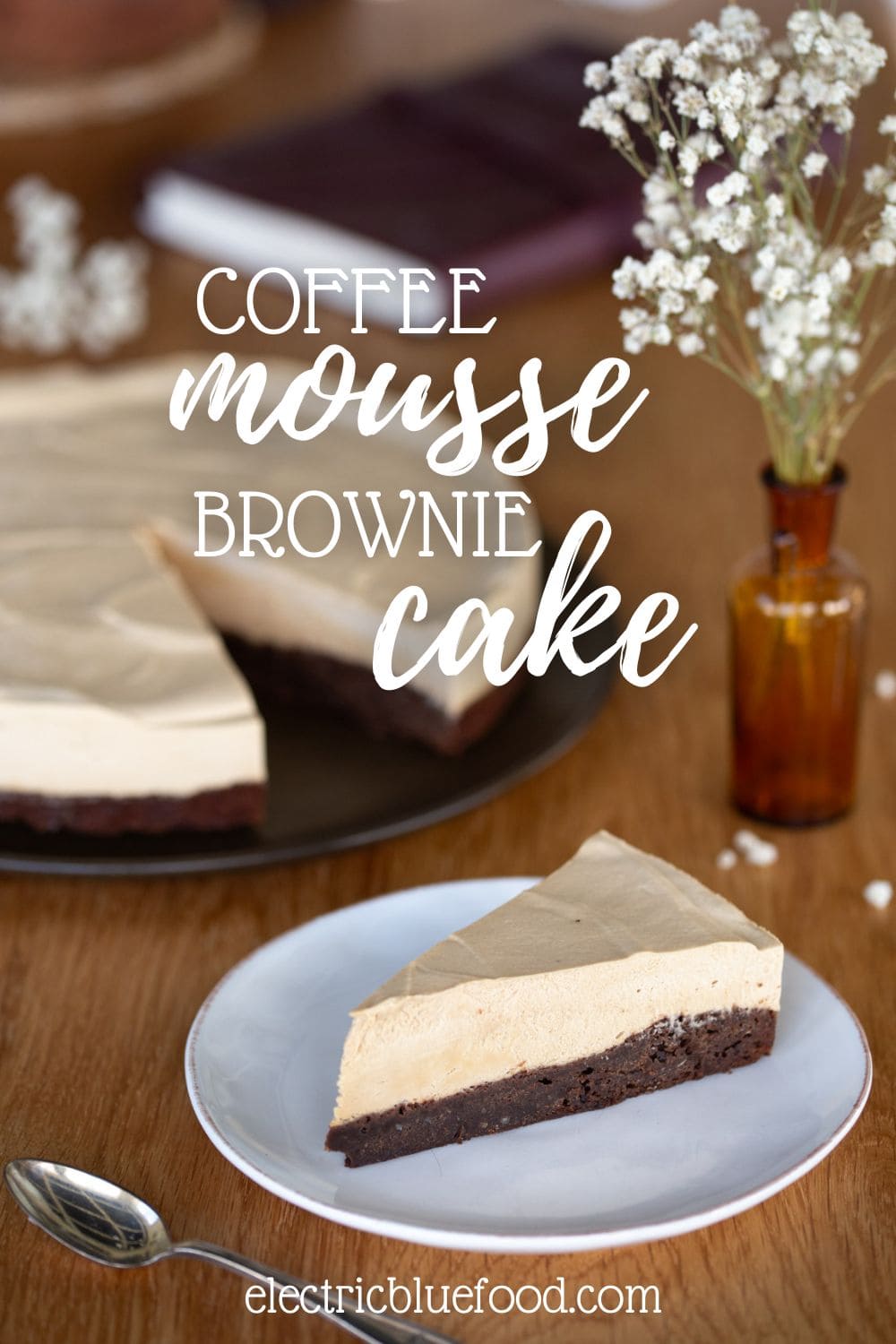 Coffee mousse cake on a chocolate brownie cake pin.