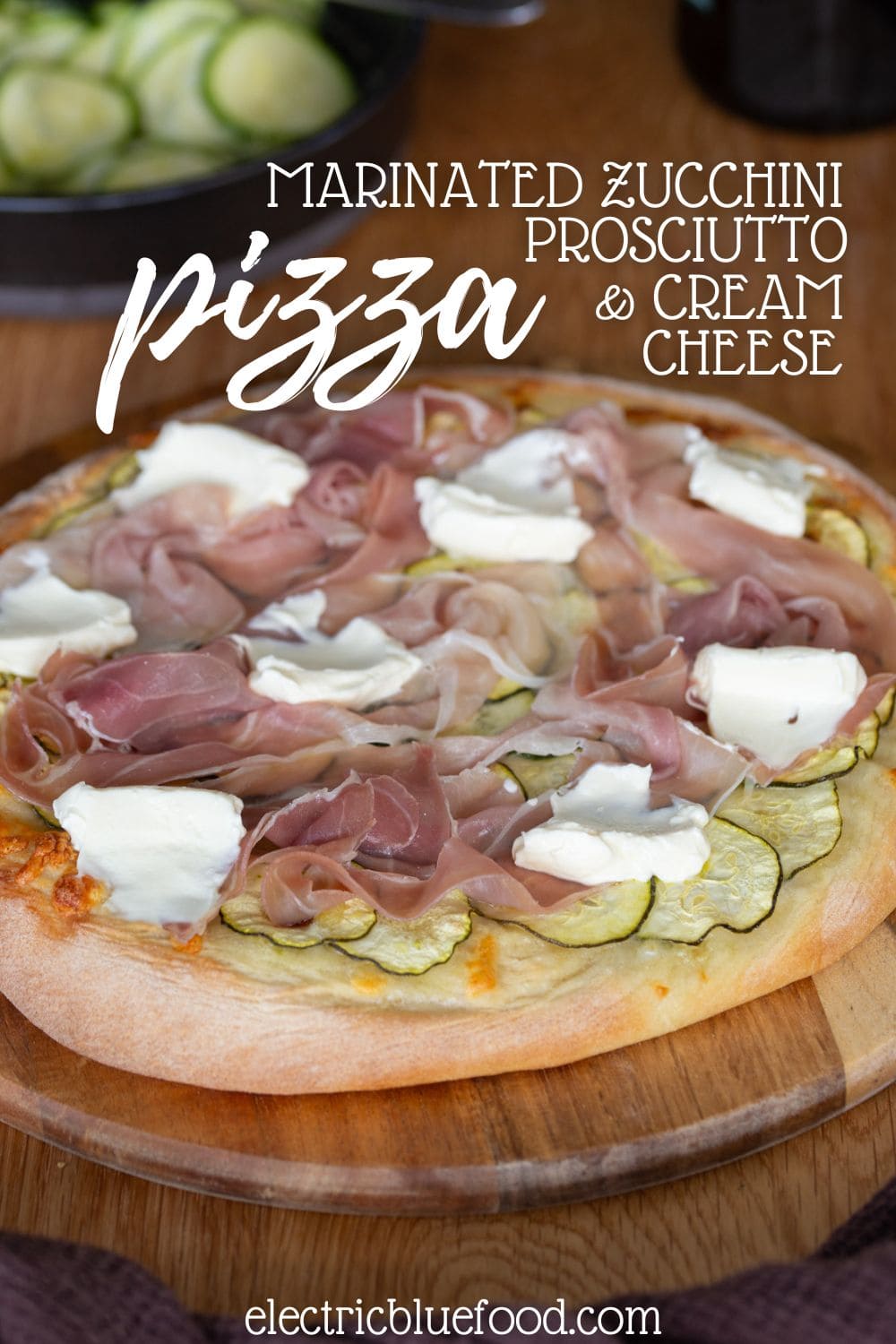 Pizza with marinated zucchini and prosciutto pin.