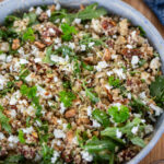 Quinoa salad with sun-dried tomatoes and feta closeup.