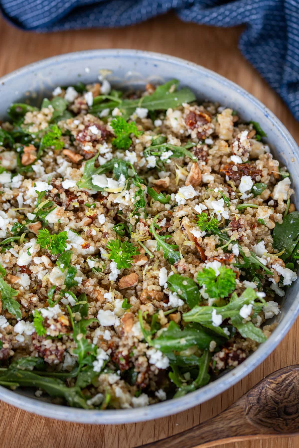 Quinoa salad with sun-dried tomatoes and feta closeup.
