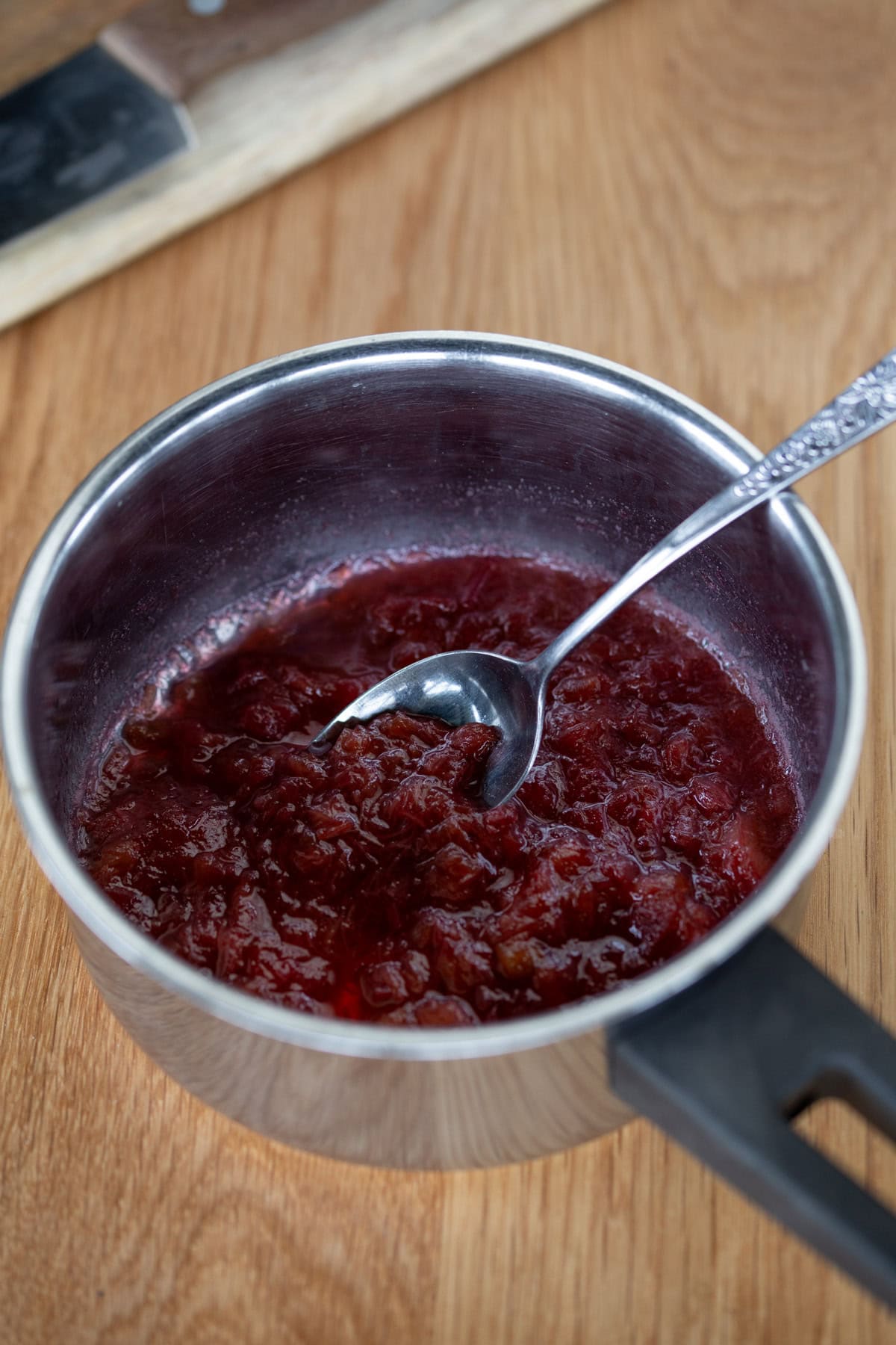 Rhubarb compote in a small saucepan.