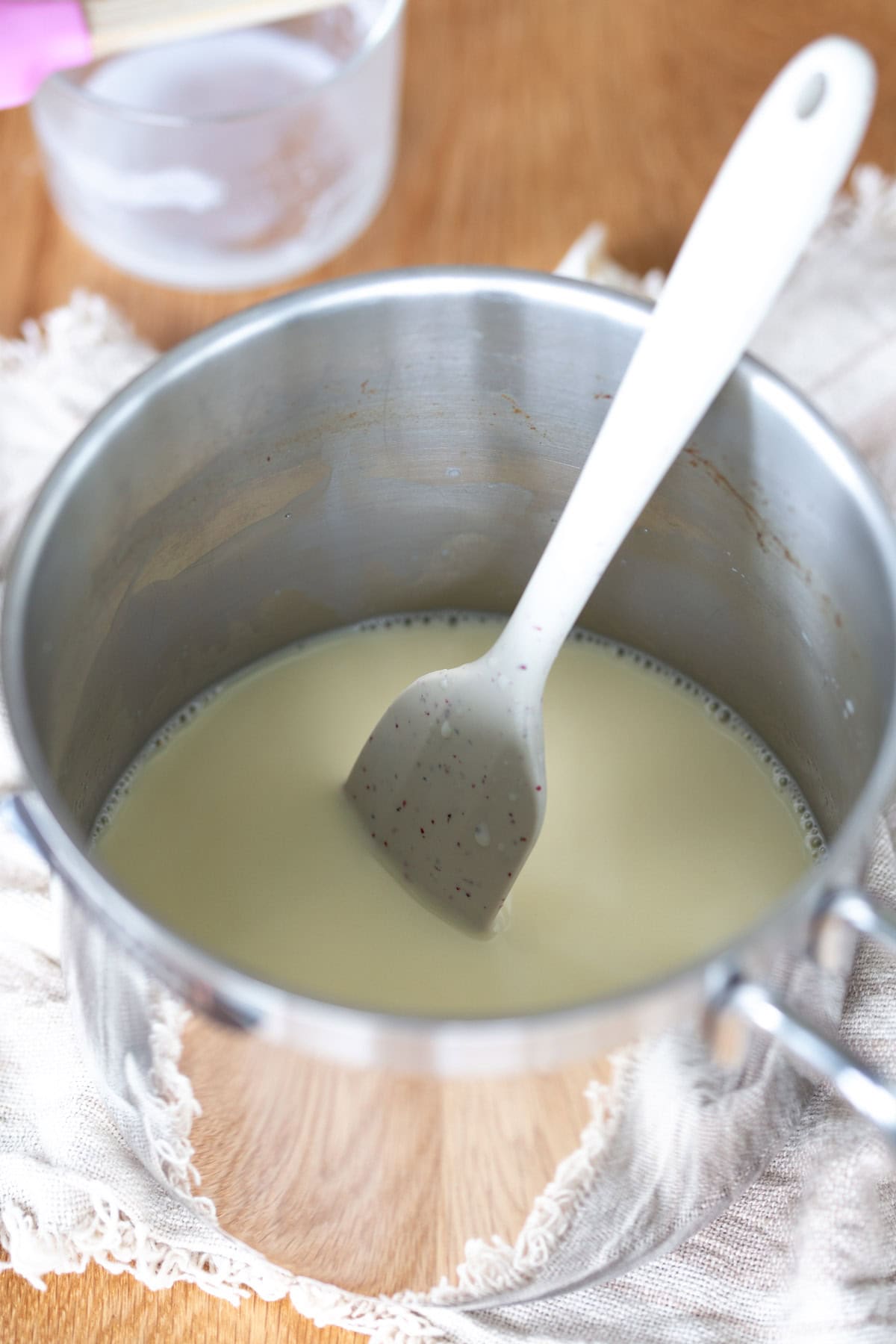 Making panna cotta in a small pan.