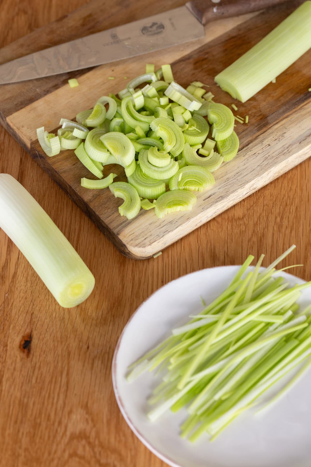 Leek cut into strips and half moons.