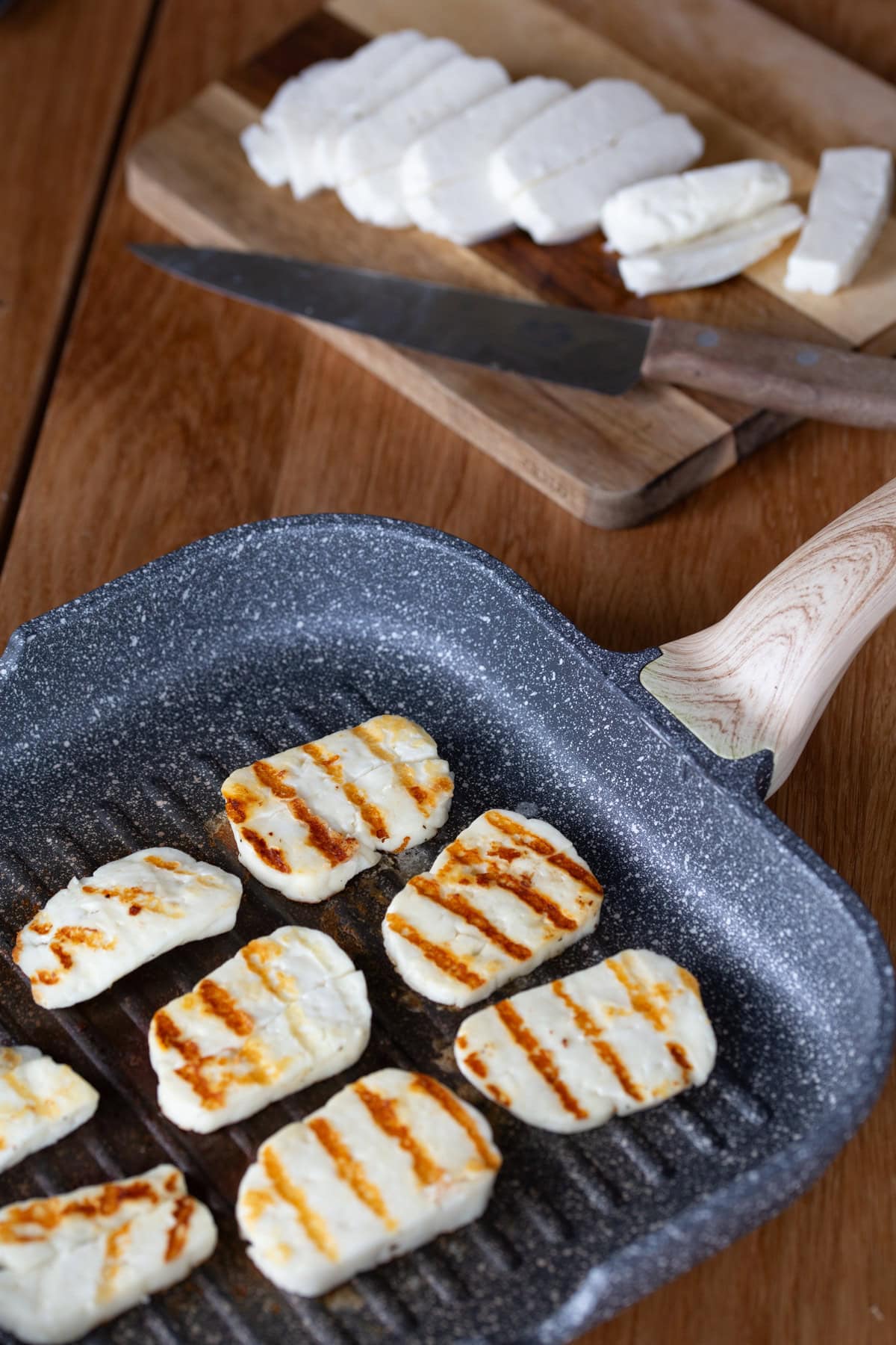 Pan-grilled halloumi slices.