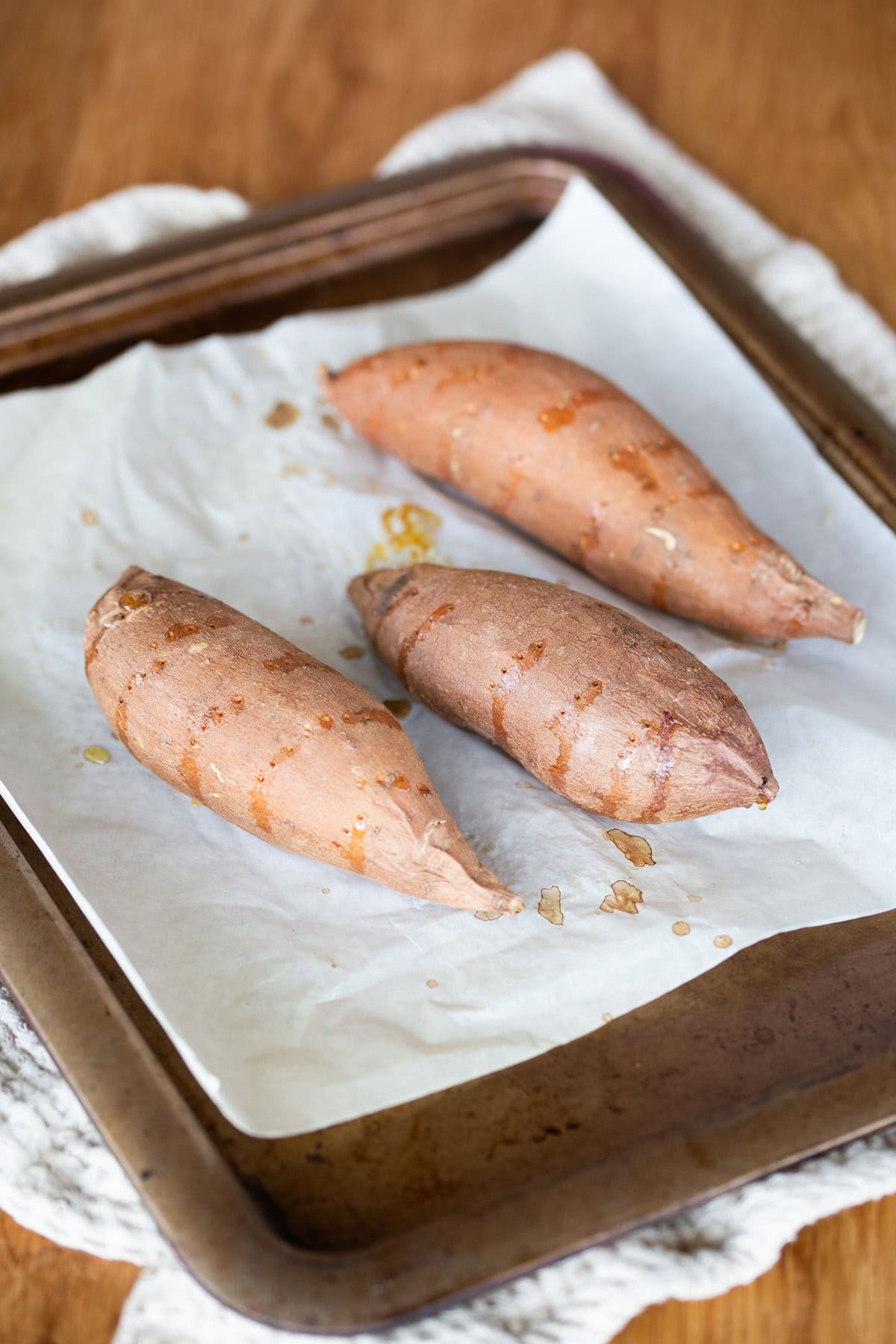 Roasting sweet potatoes in the oven.