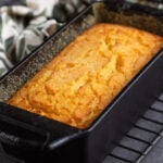 Polenta cornbread in a cast iron loaf pan.
